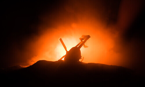 Silhouette of a helicopter burning after an aviation accident.