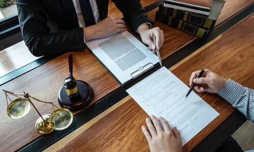 A top-down-view image of a lawyer behind his desk