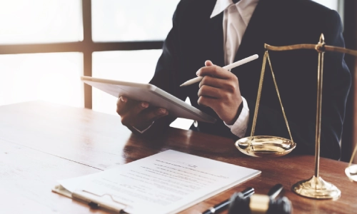 Hilmar-Irwin Personal Injury Lawyer with a tablet and stylus in his hands