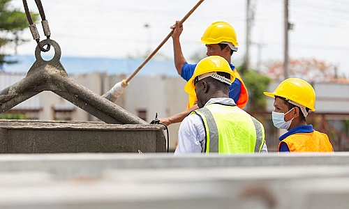 A photo of construction personnel inspecting the site after an accident.